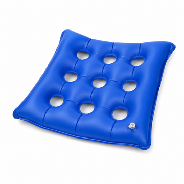 Blue inflatable air seat cushion with 9 ventilation holes on white background